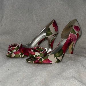 Peep toe heels with pink roses by Michelangelo.